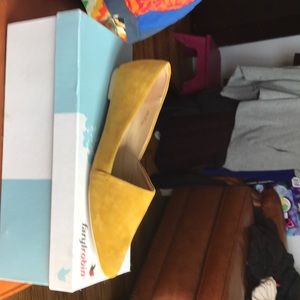 Mustard colored flats